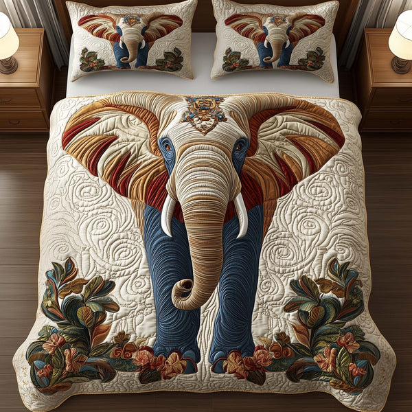 Gentle Jumbo quilted 3-piece bedding set on a made bed with two matching pillow shams