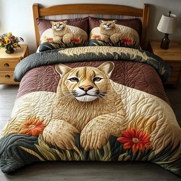 Gentle Lioness Rest quilted 3-piece bedding set on a made bed with two matching pillow shams