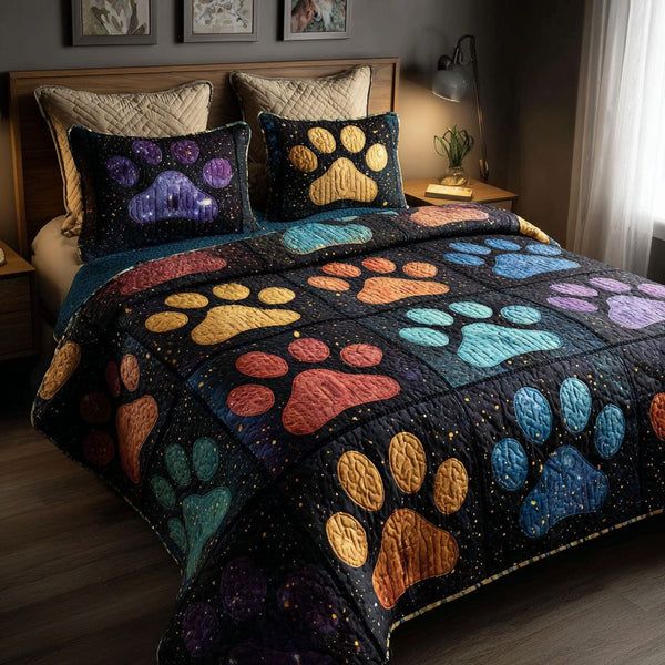 Gentle Paws quilted 3-piece bedding set on a made bed with two matching pillow shams