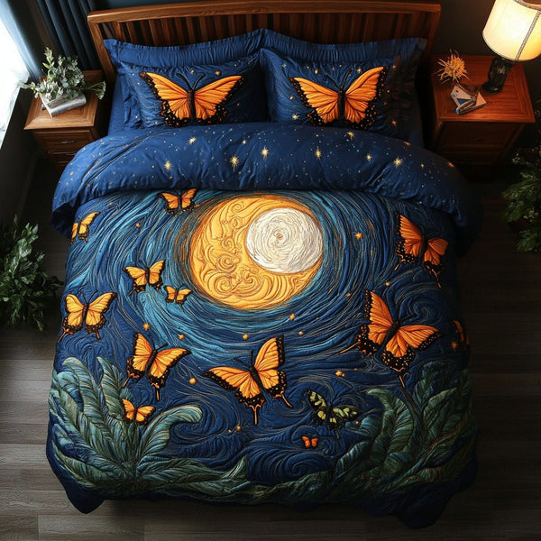 Gentle Wings quilted 3-piece bedding set on a made bed with two matching pillow shams