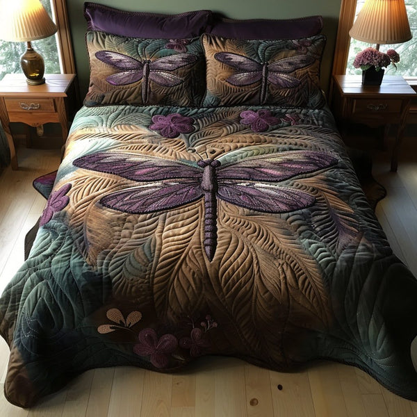 Gentle Wings quilted 3-piece bedding set on a made bed with two matching pillow shams