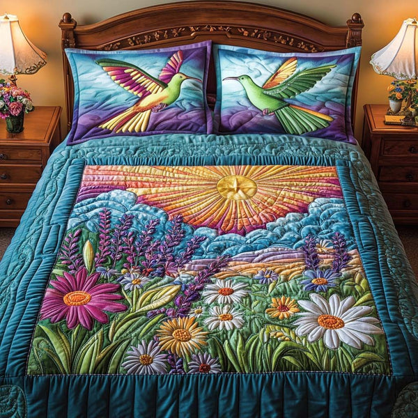 Gentle Wings quilted 3-piece bedding set on a made bed with two matching pillow shams