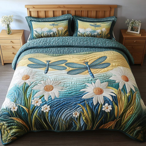 Gentle Wings quilted 3-piece bedding set on a made bed with two matching pillow shams