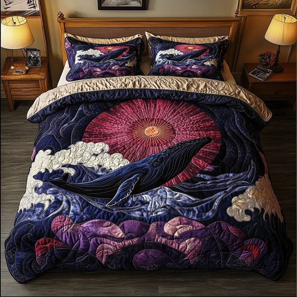 Giant Whale quilted 3-piece bedding set on a made bed in a light coastal bedroom