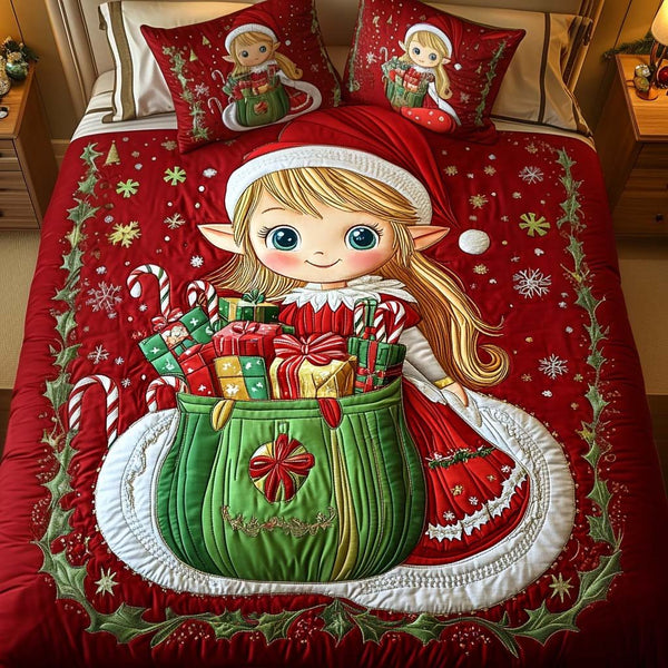 Gift Of Joy quilted 3-piece bedding set on a made bed with two matching pillow shams