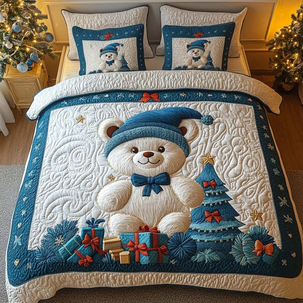 Gifted Joy quilted 3-piece bedding set on a made bed with two matching pillow shams