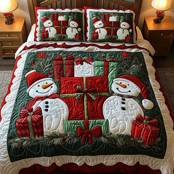 Gifted Joy quilted 3-piece bedding set on a made bed with two matching pillow shams