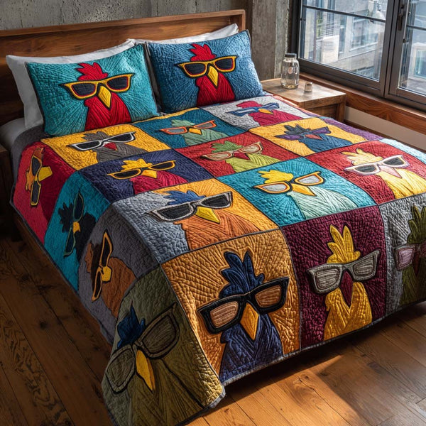 Gigglebeak quilted 3-piece bedding set on a made bed with two matching pillow shams