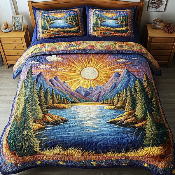 Glimmer Valley quilted 3-piece bedding set on a made bed with two matching pillow shams