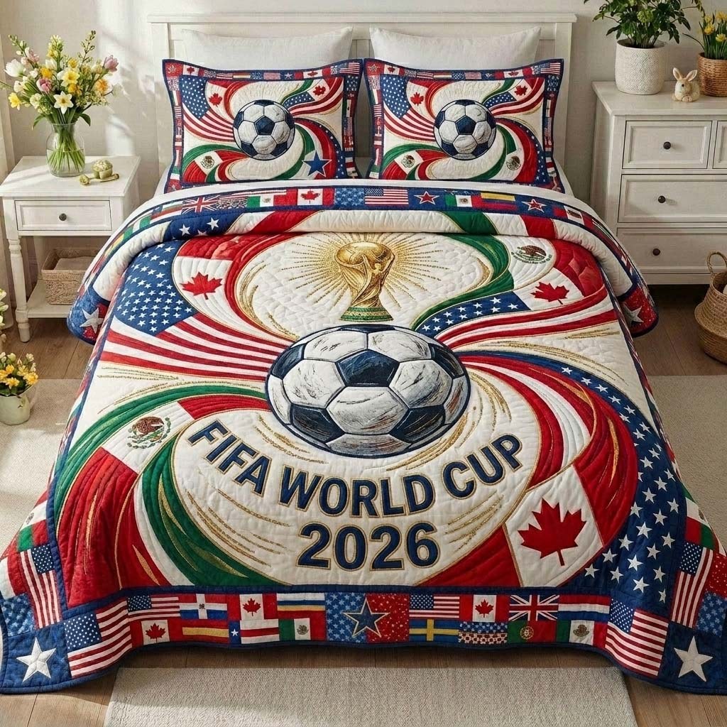 Global Cup Swirl quilted 3-piece bedding set on a made bed with two matching pillow shams