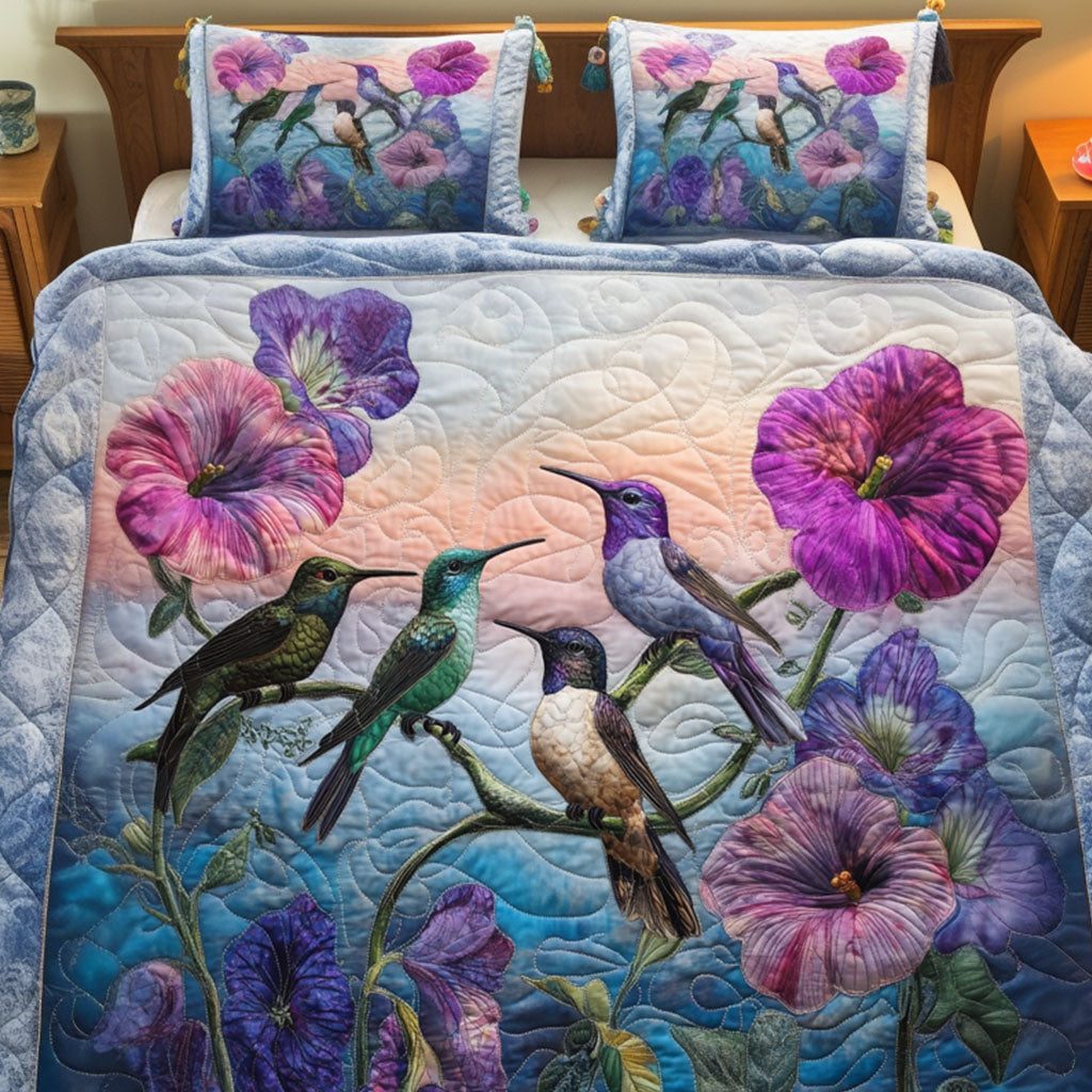 Glory Morning Sky Flight quilted 3-piece bedding set on a made bed with two matching pillow shams