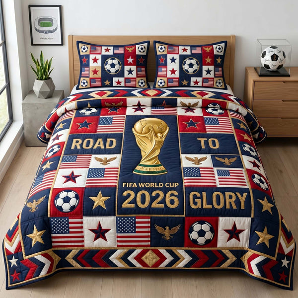 Glory Patch Cup quilted 3-piece bedding set on a made bed with two matching pillow shams