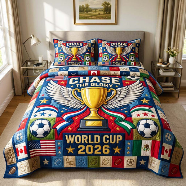 Glory Wings quilted 3-piece bedding set on a made bed with two matching pillow shams