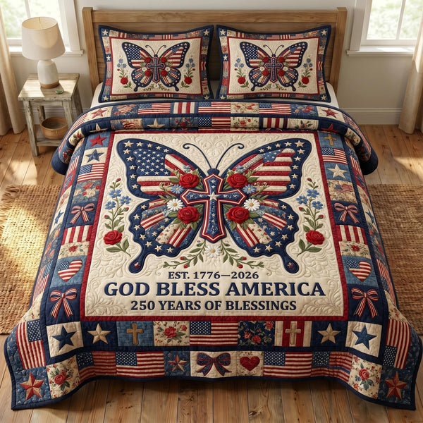 God Bless America quilted 3-piece bedding set on a made bed in a warmly lit bedroom