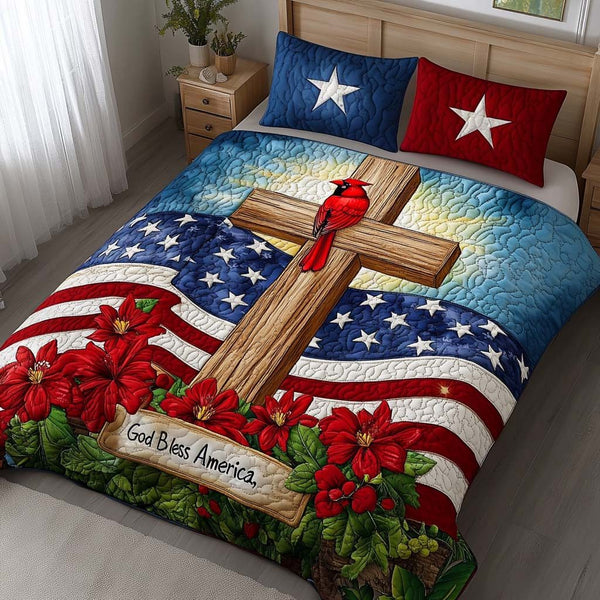God Bless America quilted 3-piece bedding set on a made bed in a warmly lit bedroom
