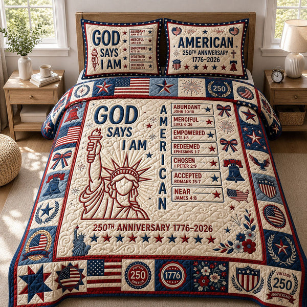 God Says I Am quilted 3-piece bedding set on a made bed in a softly lit bedroom