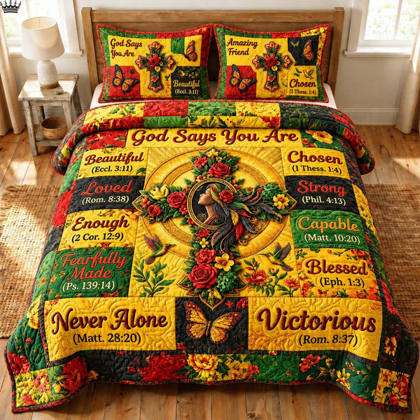 God Says You Are quilted 3-piece bedding set on a made bed in a softly lit bedroom