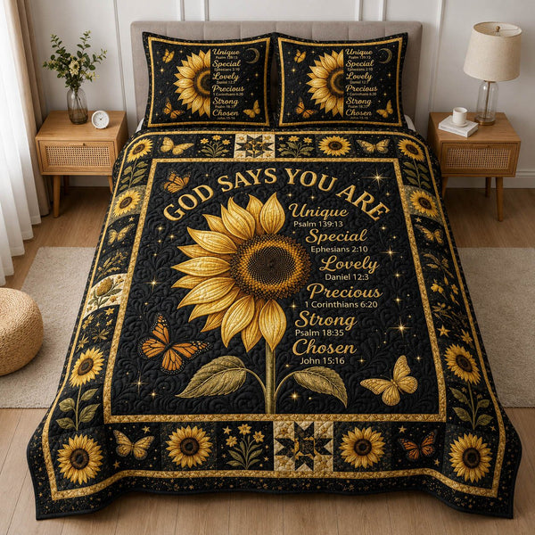 God Says You Are quilted 3-piece bedding set on a made bed in a softly lit bedroom