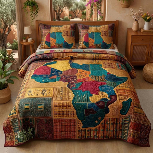 Golden Africa quilted 3-piece bedding set on a made bed with two matching pillow shams