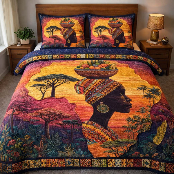 Golden Ancestral Woman quilted 3-piece bedding set on a made bed with two matching pillow shams