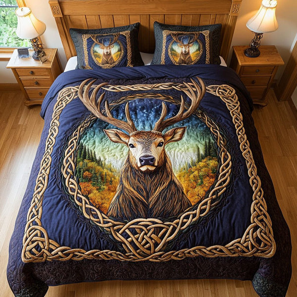 Golden Antler Dreams quilted 3-piece bedding set on a made bed with two matching pillow shams