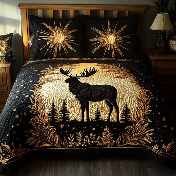 Golden Antlers quilted 3-piece bedding set on a made bed with two matching pillow shams