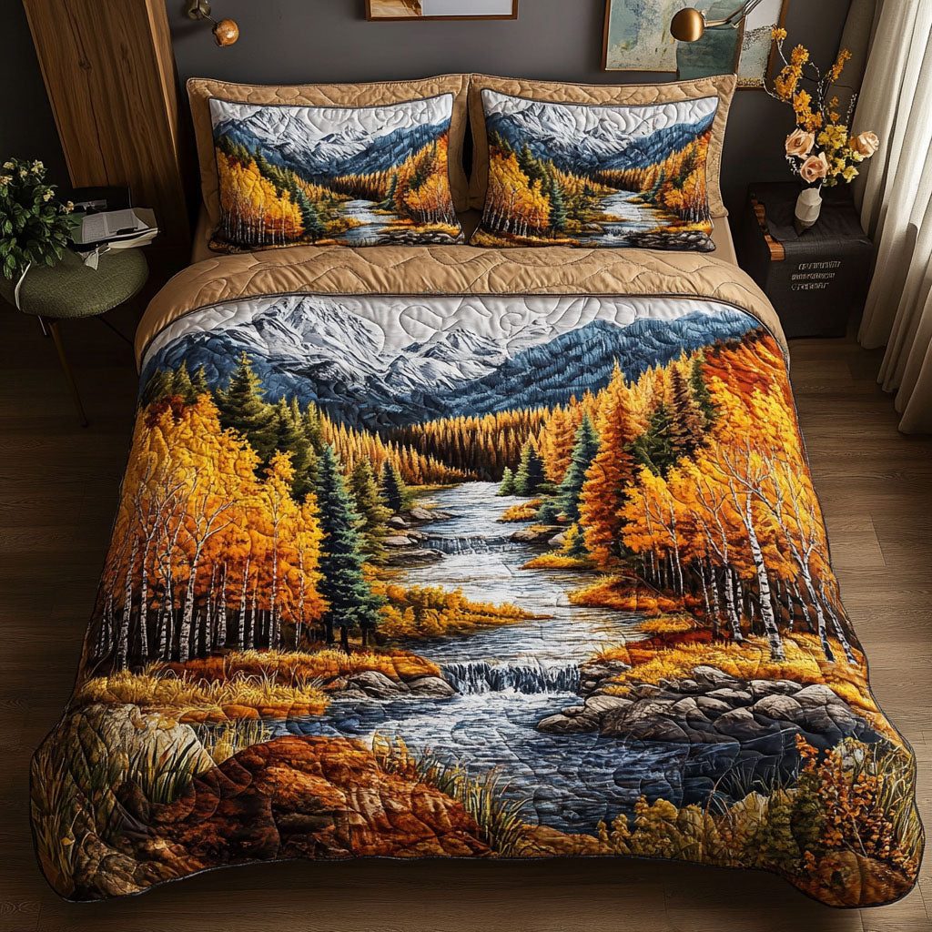Golden Autumn Stream quilted 3-piece bedding set on a made bed with two matching pillow shams