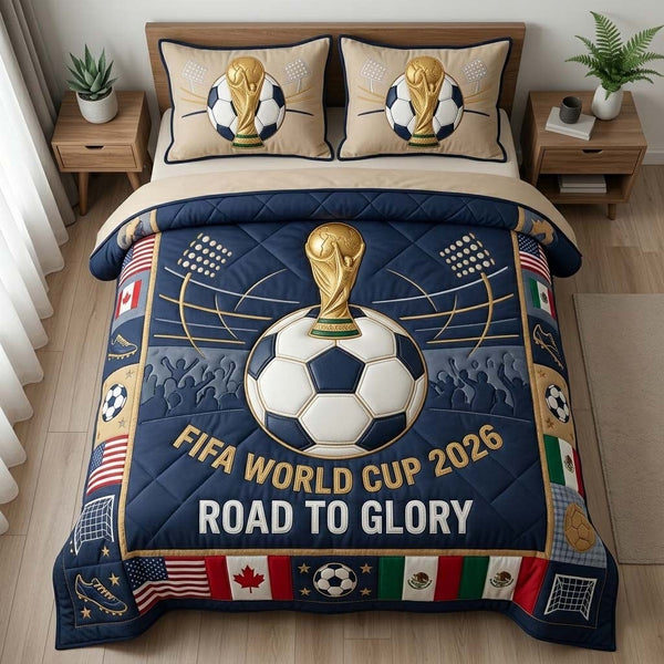 Golden Ball Glory quilted 3-piece bedding set on a made bed with two matching pillow shams