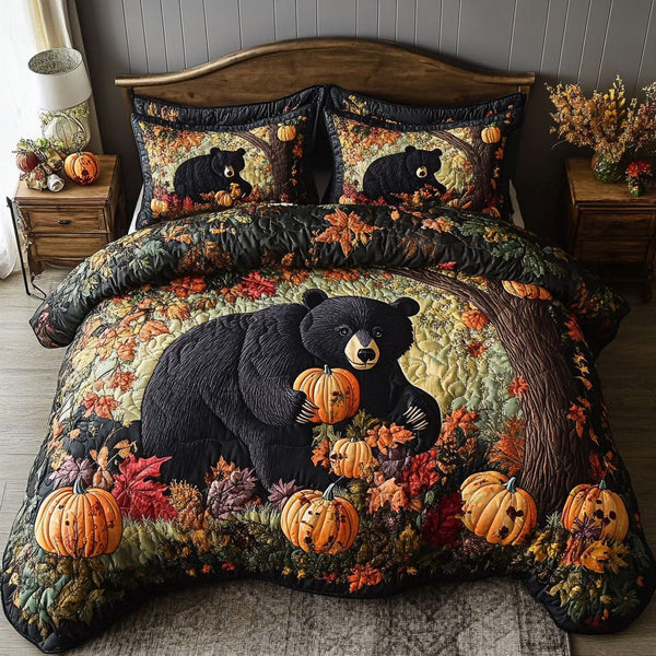Golden Bear Trail quilted 3-piece bedding set on a made bed with two matching pillow shams