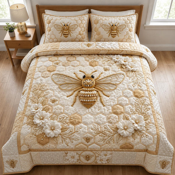 Golden Bee quilted 3-piece bedding set on a made bed with two matching pillow shams