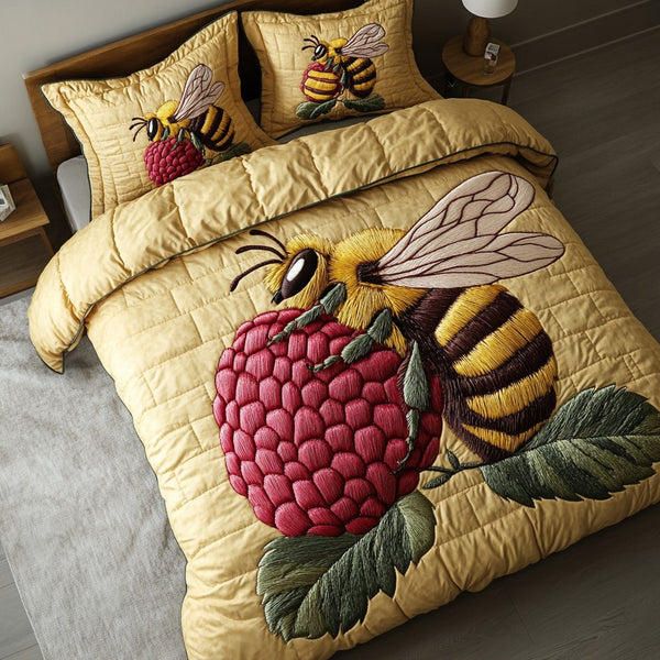 Golden Bee quilted 3-piece bedding set on a made bed with two matching pillow shams