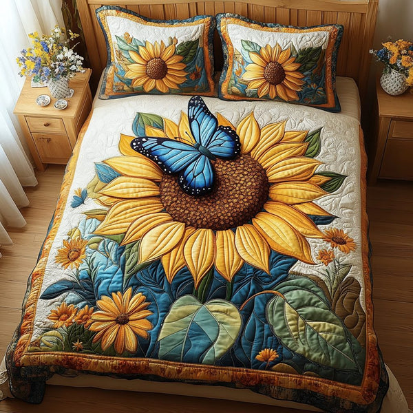 Golden Bloom quilted 3-piece bedding set on a made bed with two matching pillow shams