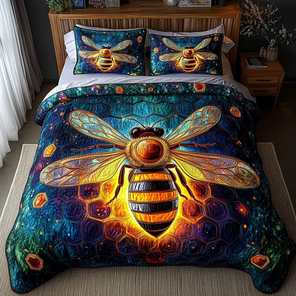Golden Buzz quilted 3-piece bedding set on a made bed with two matching pillow shams