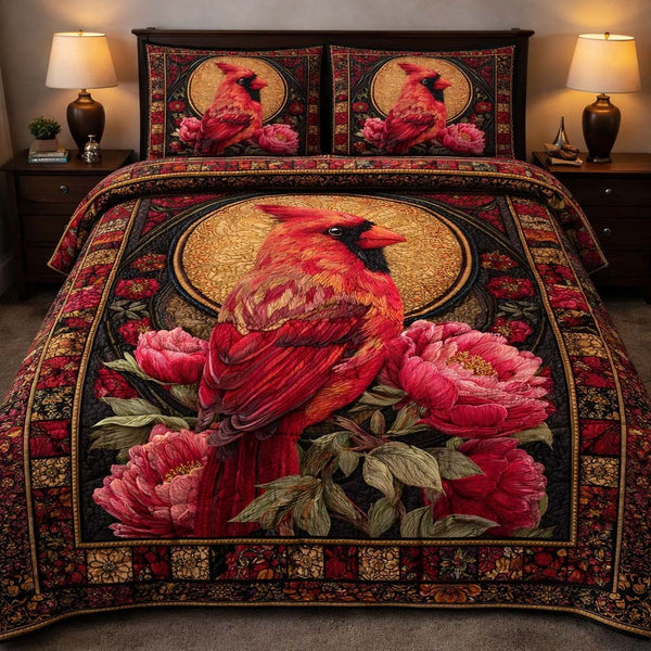 Golden Cardinal Majesty quilted 3-piece bedding set on a made bed with two matching pillow shams