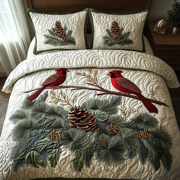Golden Cardinal quilted 3-piece bedding set on a made bed with two matching pillow shams