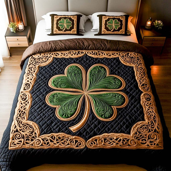 Golden Clover quilted 3-piece bedding set on a made bed with two matching pillow shams
