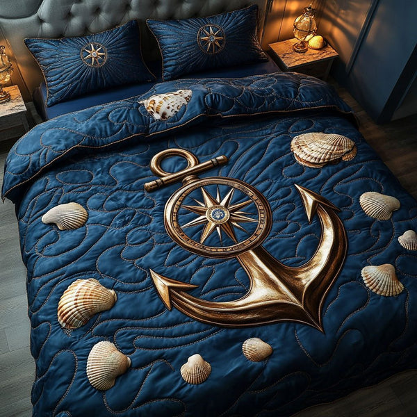 Golden Compass Anchor quilted 3-piece bedding set on a made bed in a light coastal bedroom