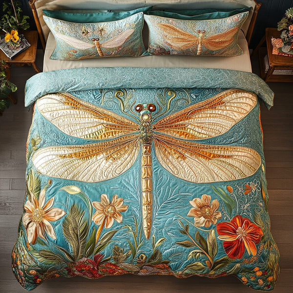 Golden Dragonfly quilted 3-piece bedding set on a made bed with two matching pillow shams