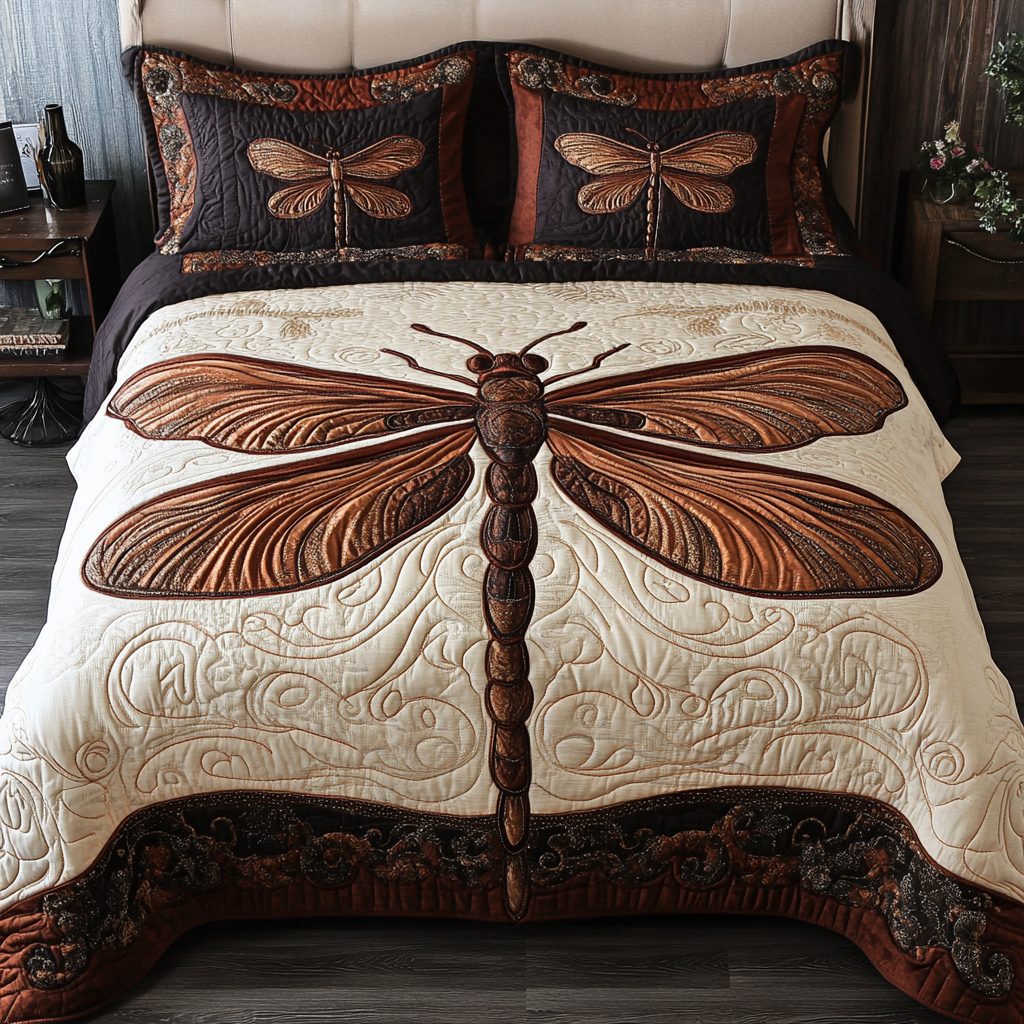 Golden Dragonfly quilted 3-piece bedding set on a made bed with two matching pillow shams