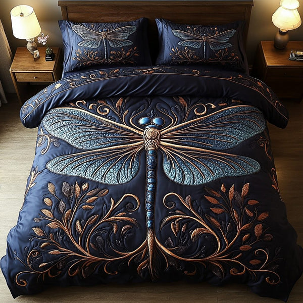 Golden Dragonfly quilted 3-piece bedding set on a made bed with two matching pillow shams