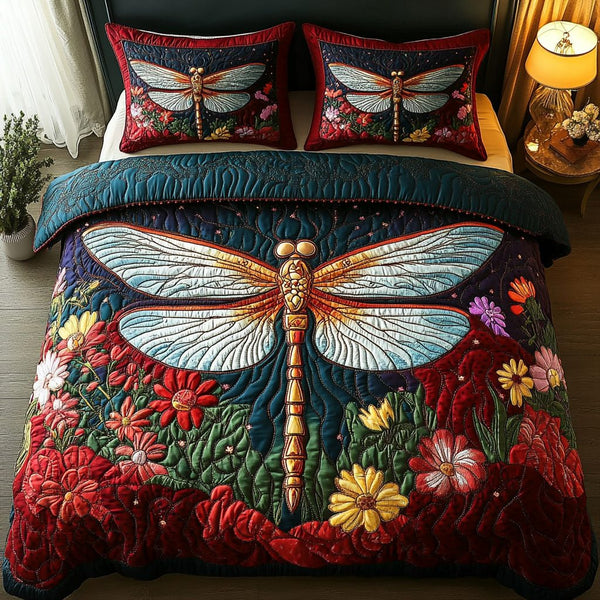 Golden Dragonfly quilted 3-piece bedding set on a made bed with two matching pillow shams