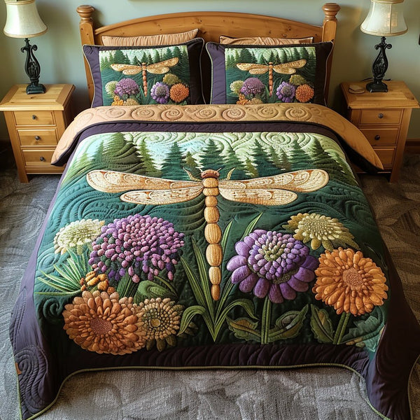 Golden Dragonfly quilted 3-piece bedding set on a made bed with two matching pillow shams