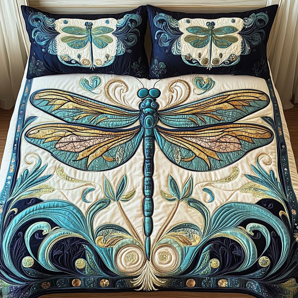 Golden Dragonfly quilted 3-piece bedding set on a made bed with two matching pillow shams
