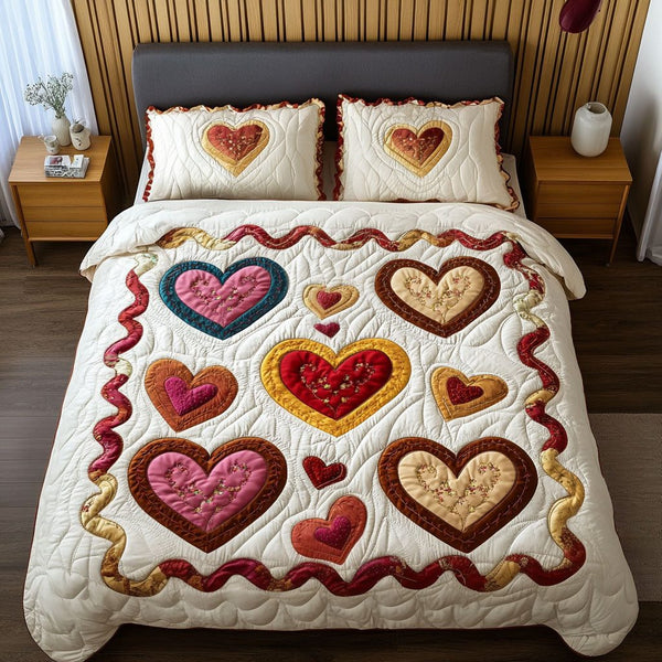 Golden Embrace quilted 3-piece bedding set on a made bed with two matching pillow shams