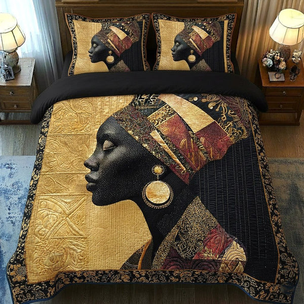 Golden Essence quilted 3-piece bedding set on a made bed with two matching pillow shams