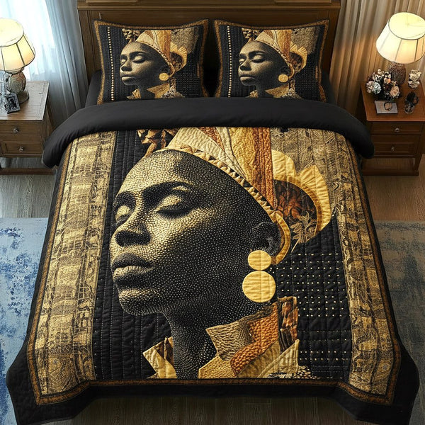 Golden Essence quilted 3-piece bedding set on a made bed with two matching pillow shams