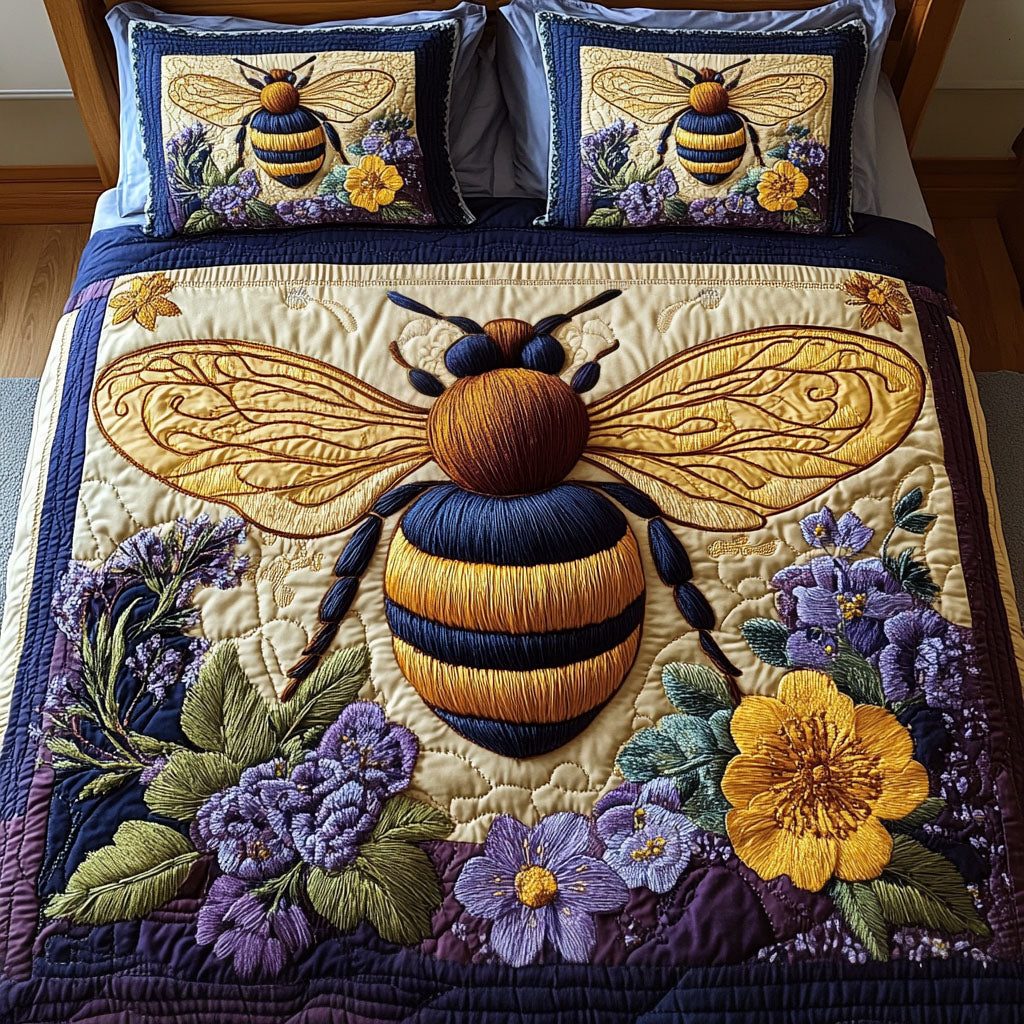 Golden Essence quilted 3-piece bedding set on a made bed with two matching pillow shams