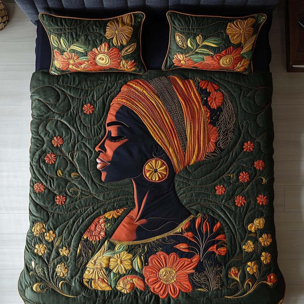 Golden Essence quilted 3-piece bedding set on a made bed with two matching pillow shams