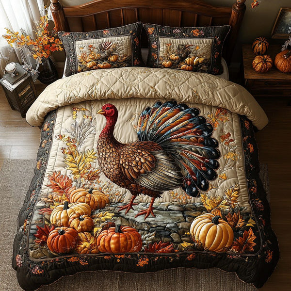 Golden Feathers quilted 3-piece bedding set on a made bed with two matching pillow shams