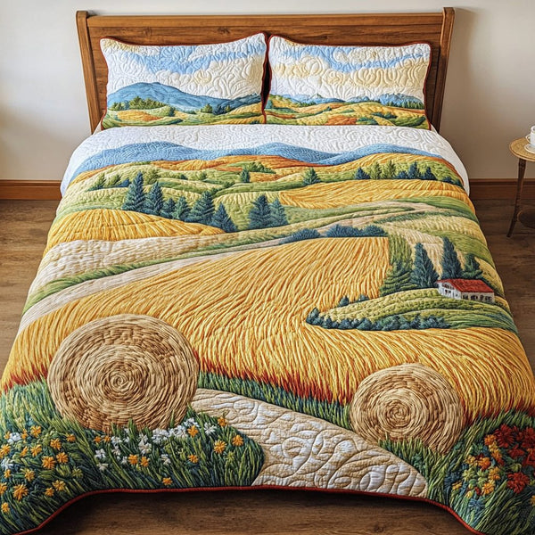 Golden Fields quilted 3-piece bedding set on a made bed with two matching pillow shams